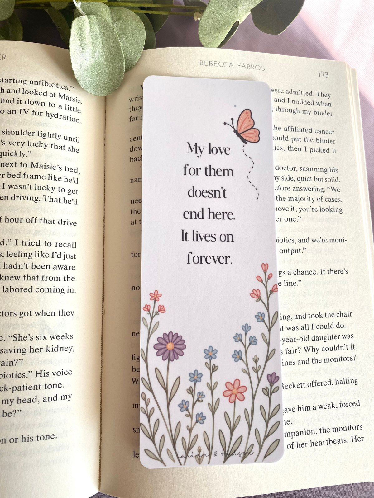 Back side of I am still their mother bookmark on a book