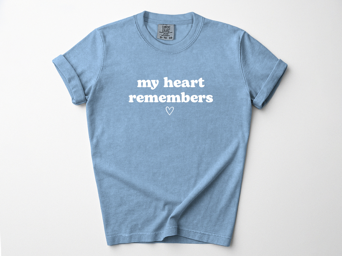 My Heart Remembers angel mom remembrance shirt flat lay in blue